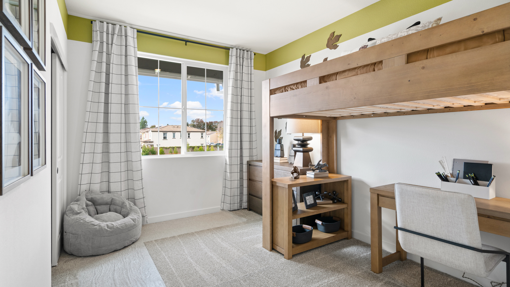 A room with a desk and a chair.