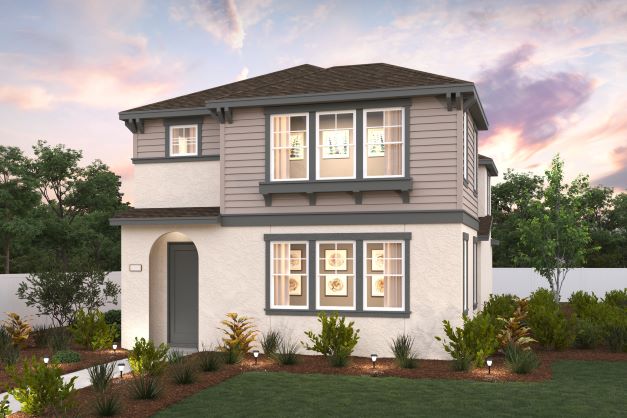 A house with a lawn and trees.