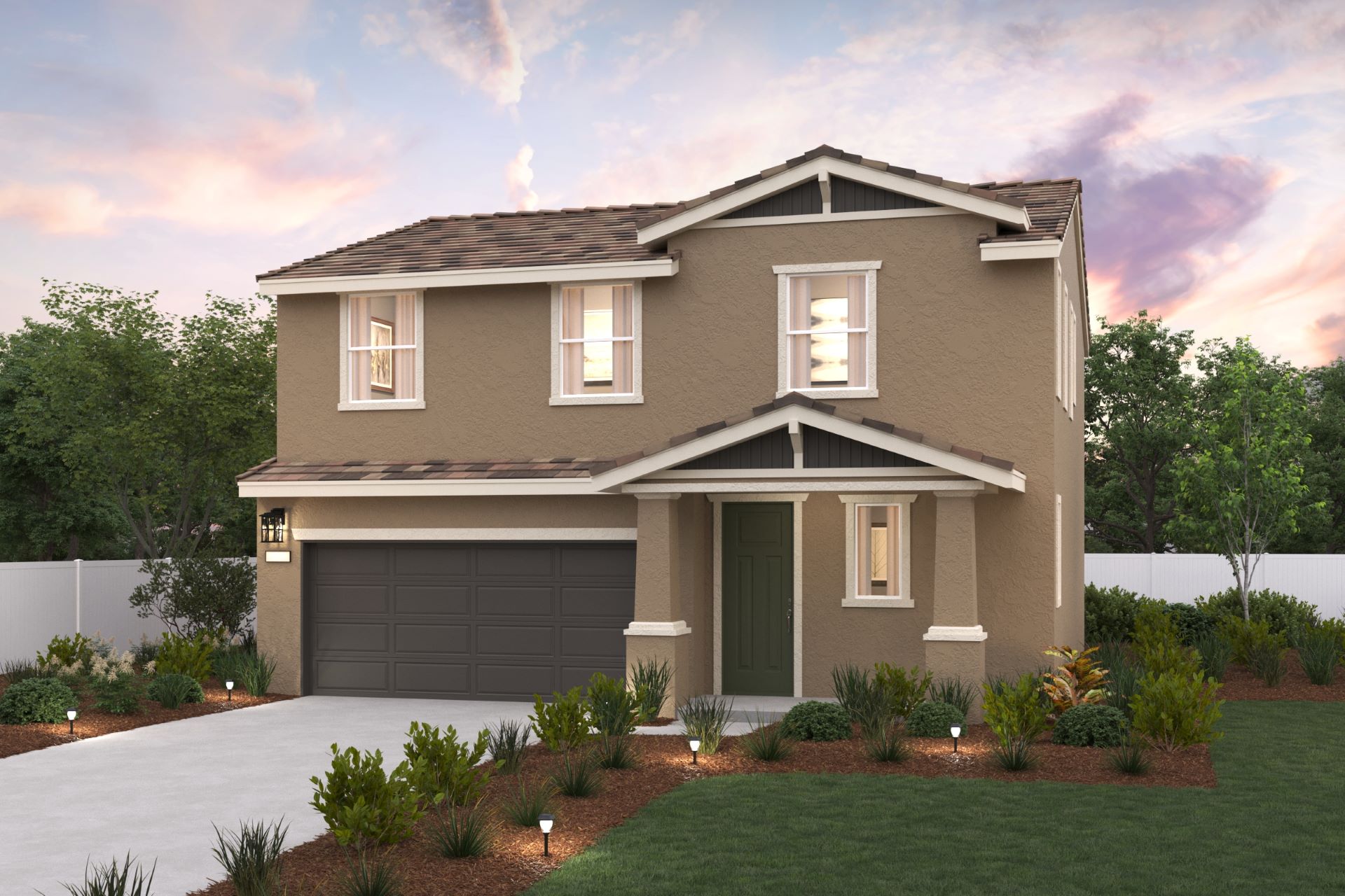 A house with a garage and a lawn in front of it.