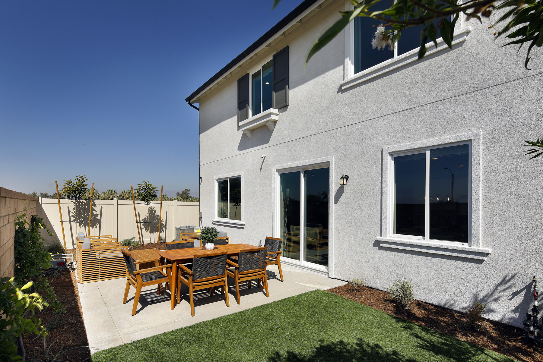 A house with a table and chairs.