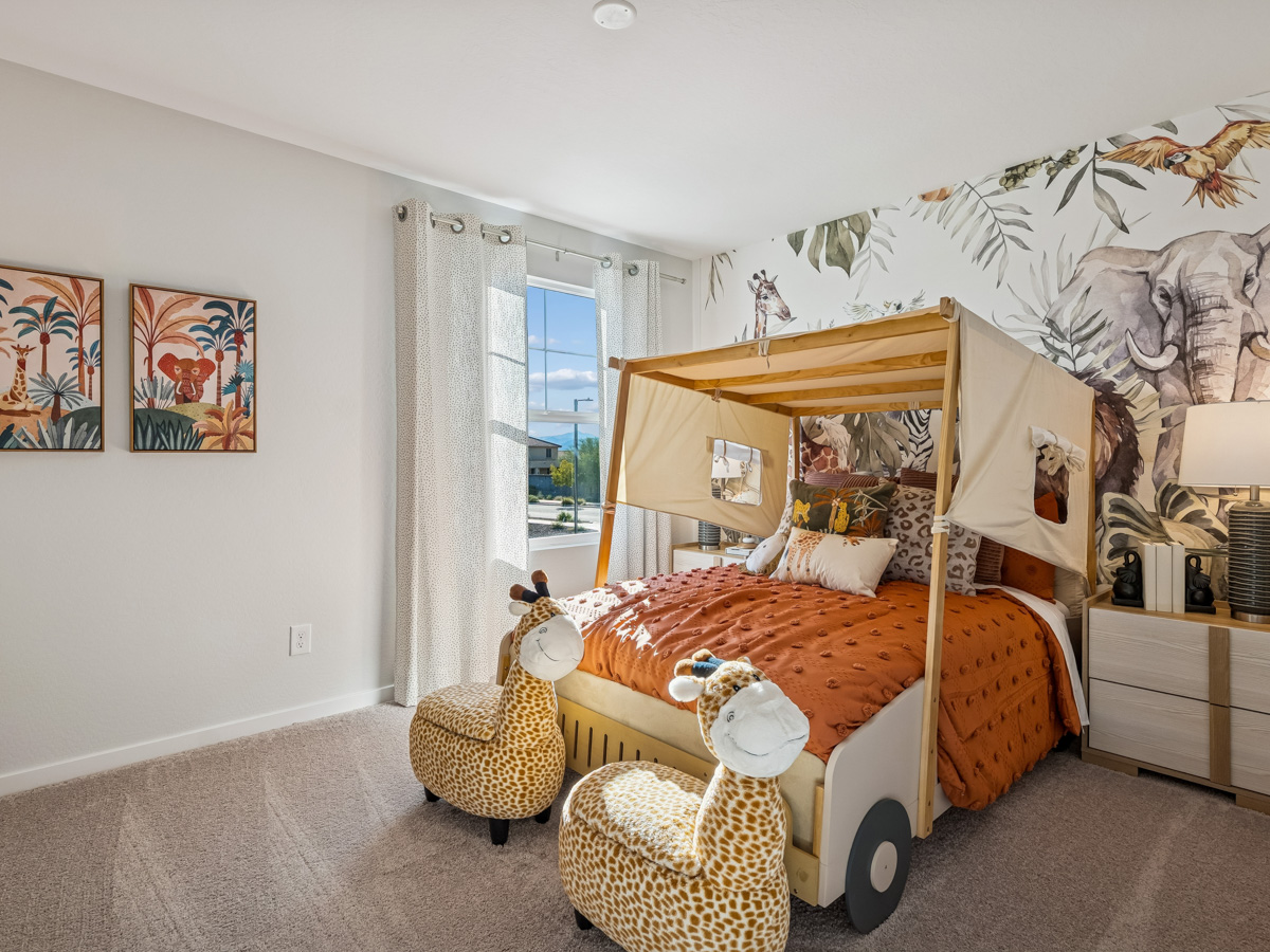 A bedroom with a bed and a basket.