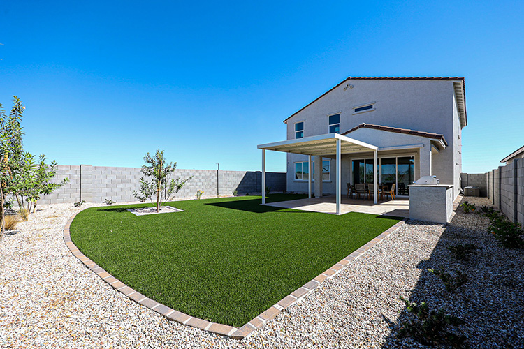 A house with a large front yard.