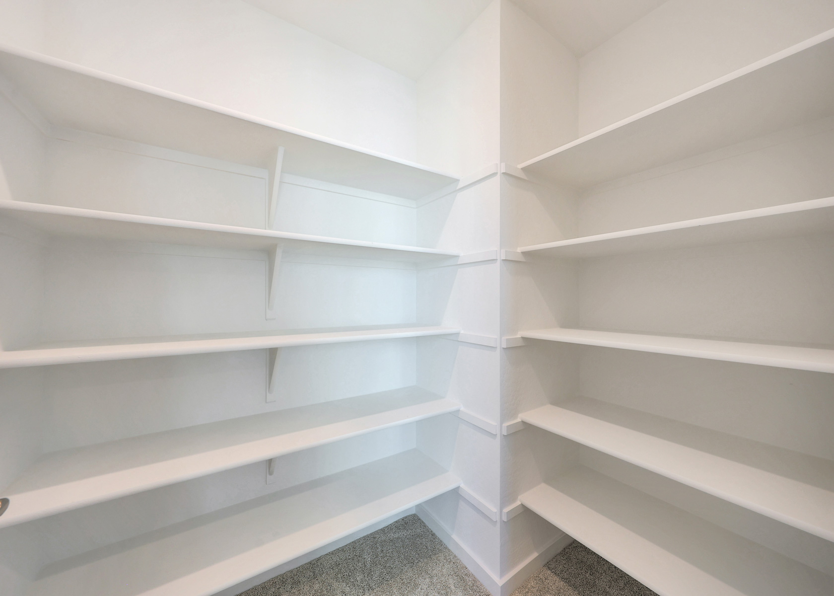 A white shelf with white shelves.