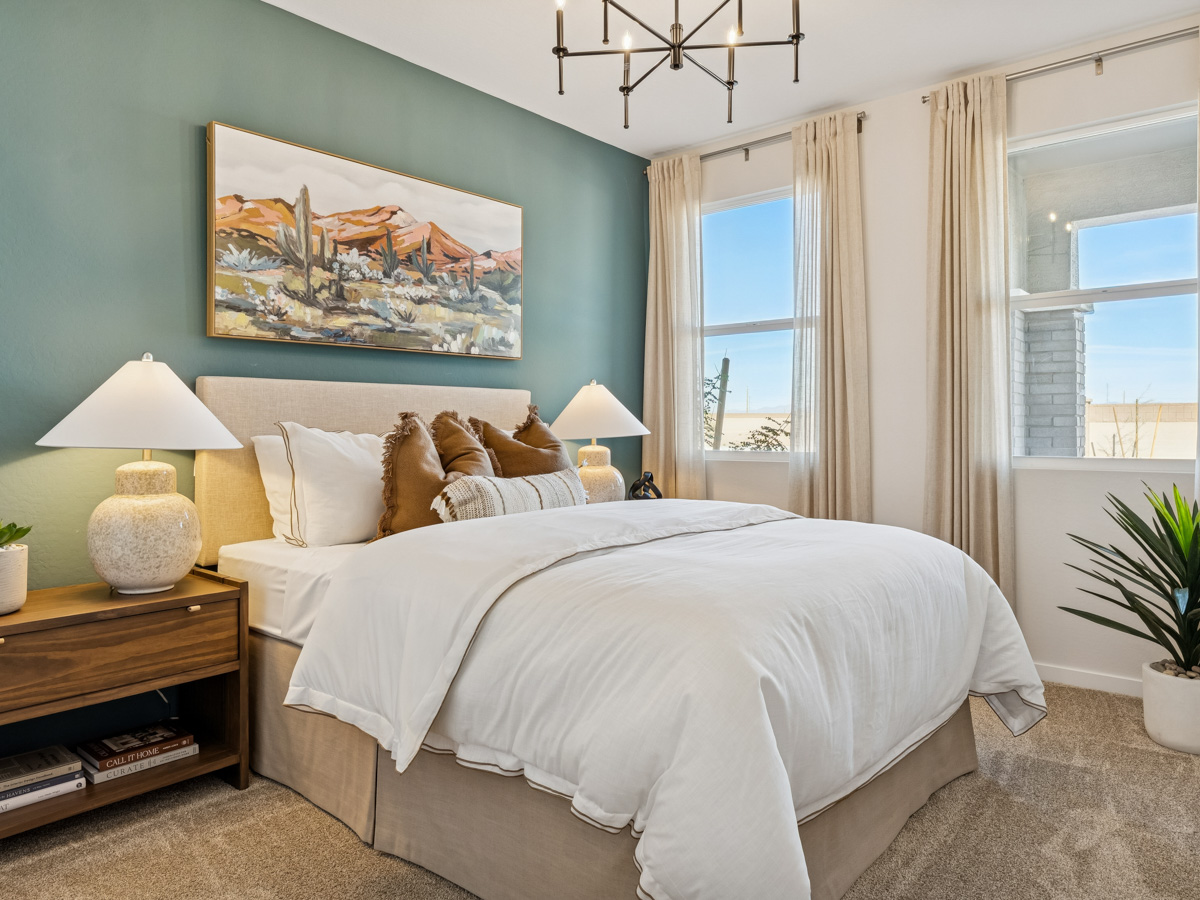 A bedroom with a large bed.