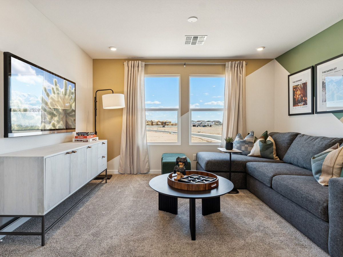 A living room with a large window.