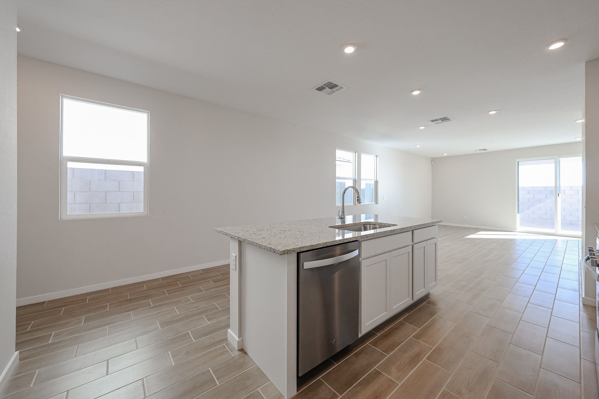 A kitchen with a large island.