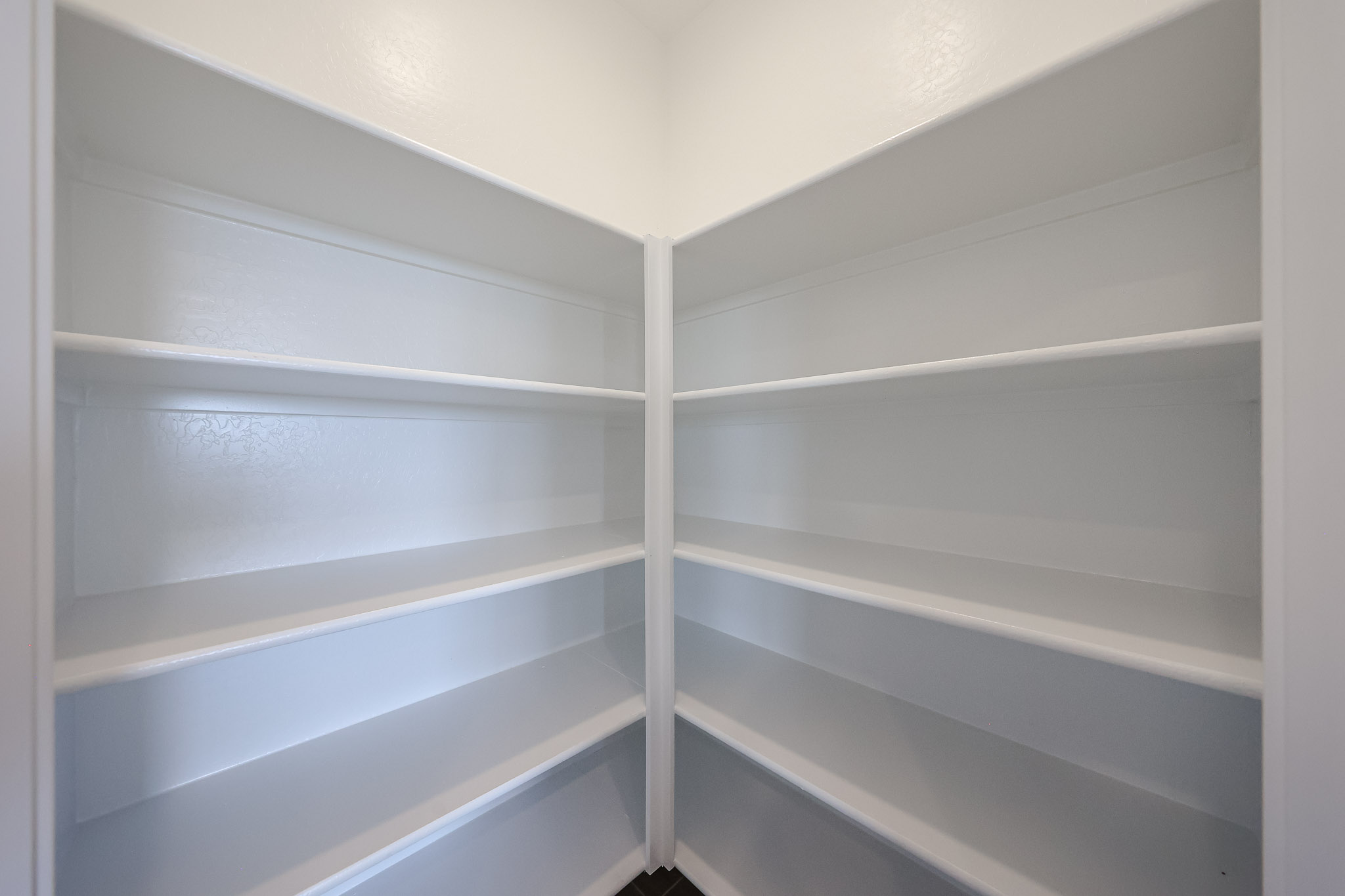 A white shelf with white shelves.