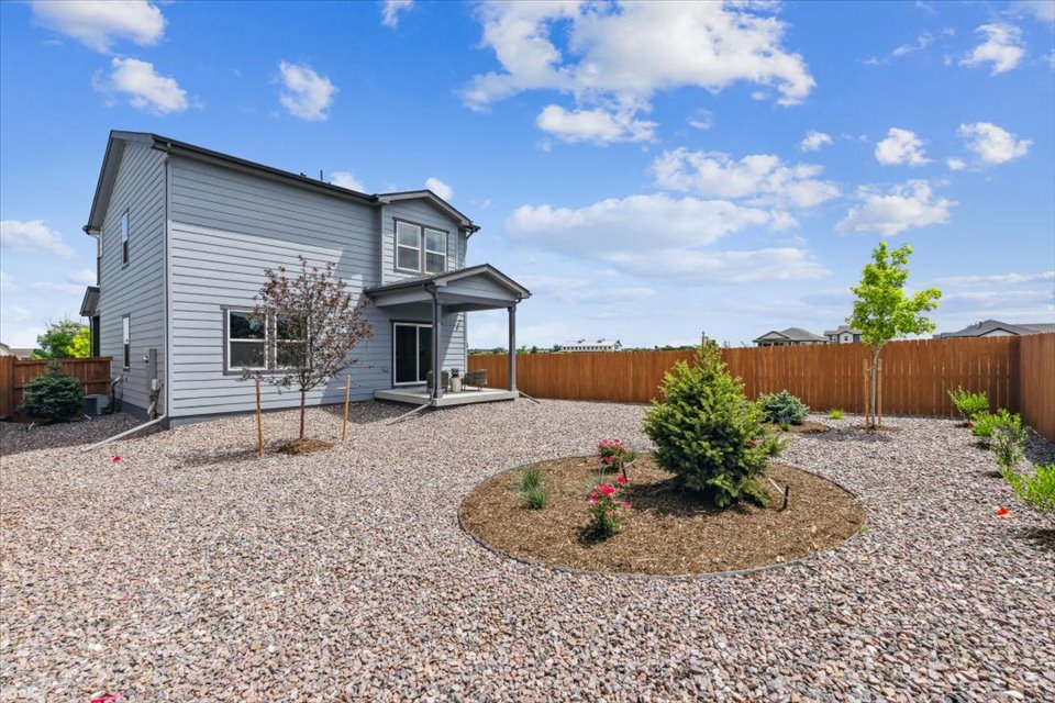 A small garden in front of a house.