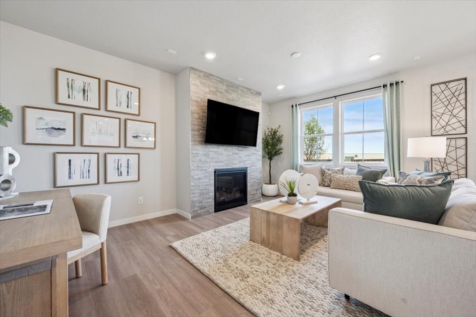 A living room with a fireplace.