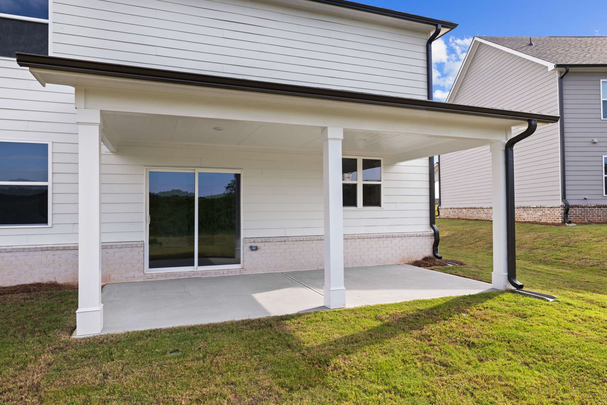 A house with a white porch.