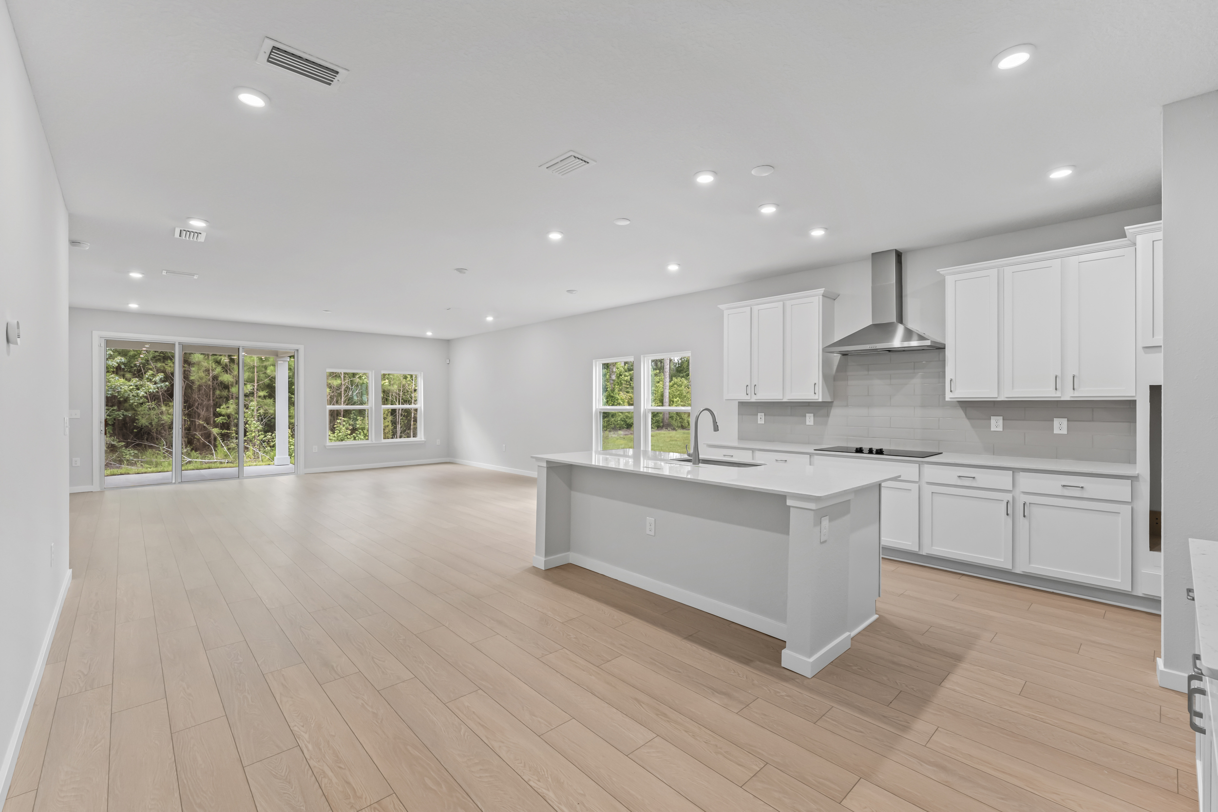 Dogwood Plan Lot 582 Great Room with Kitchen and Large Living Area at NorthShore in Kingsland