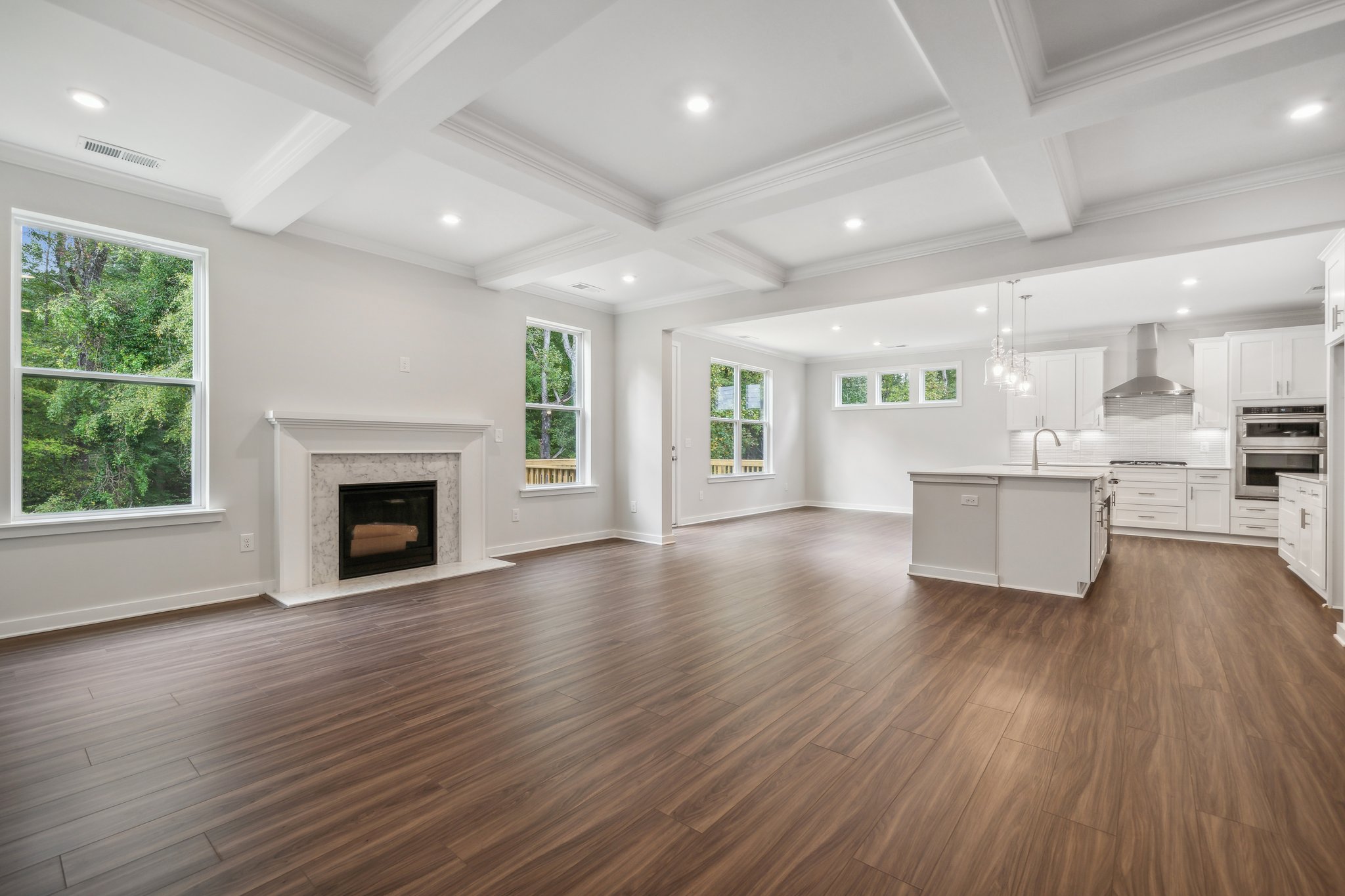 A large kitchen with a fireplace.