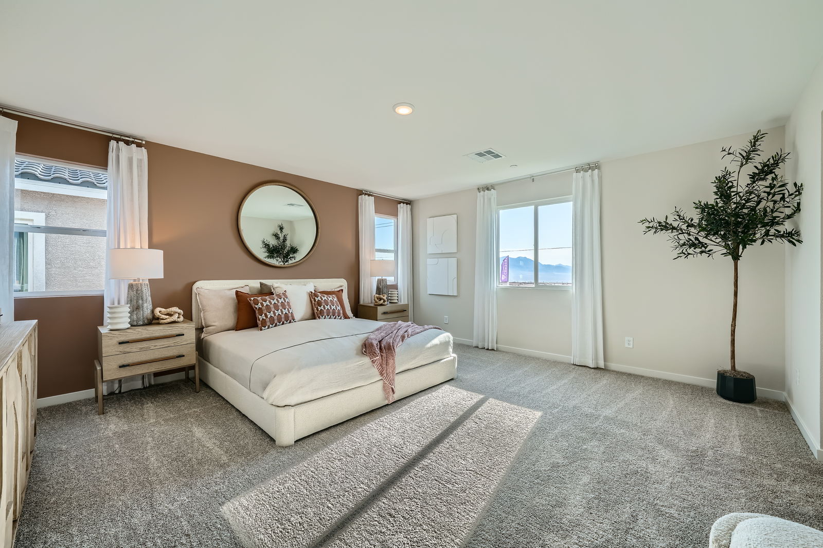 A large bedroom with a large bed.