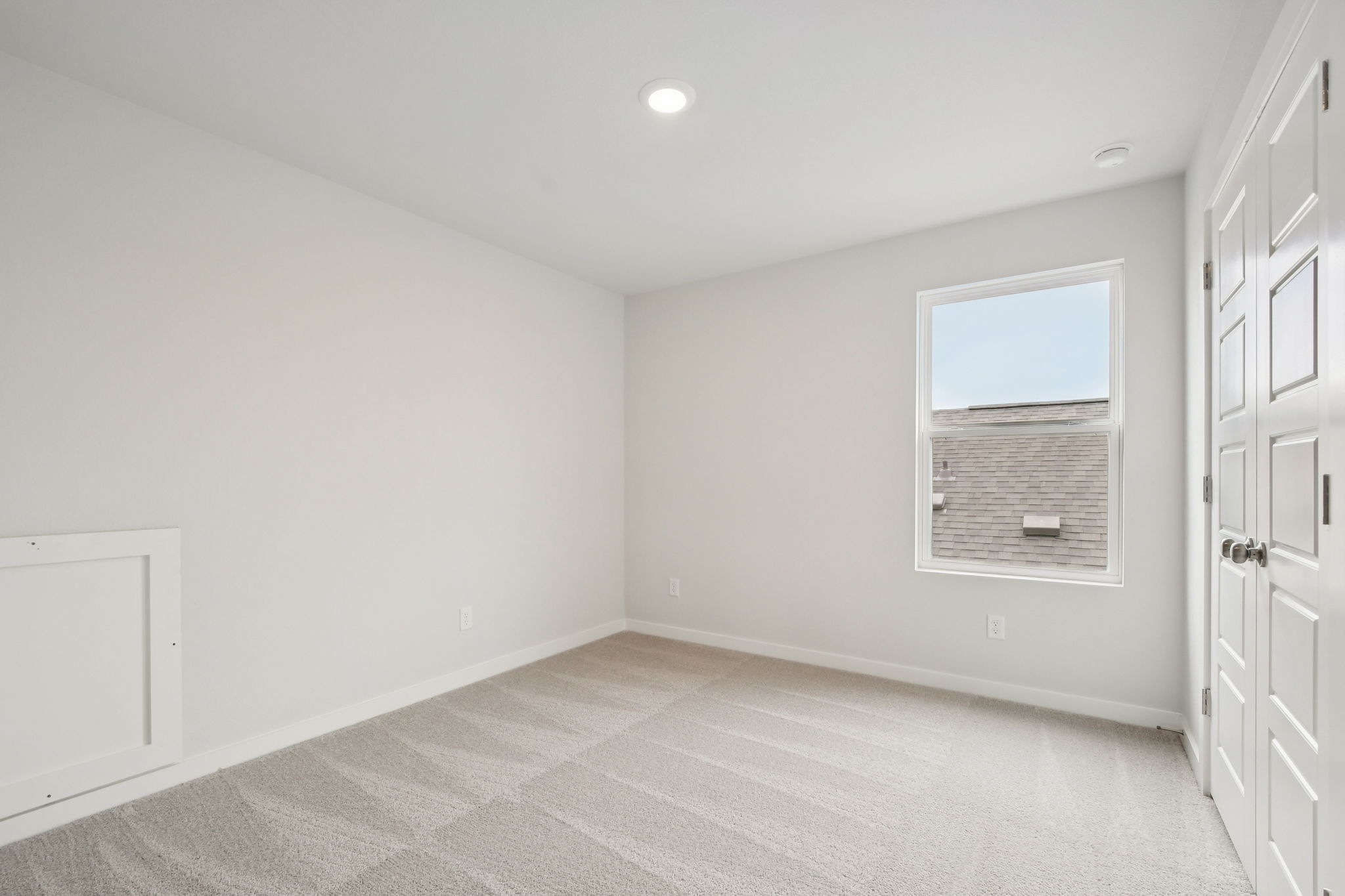 A room with white walls.