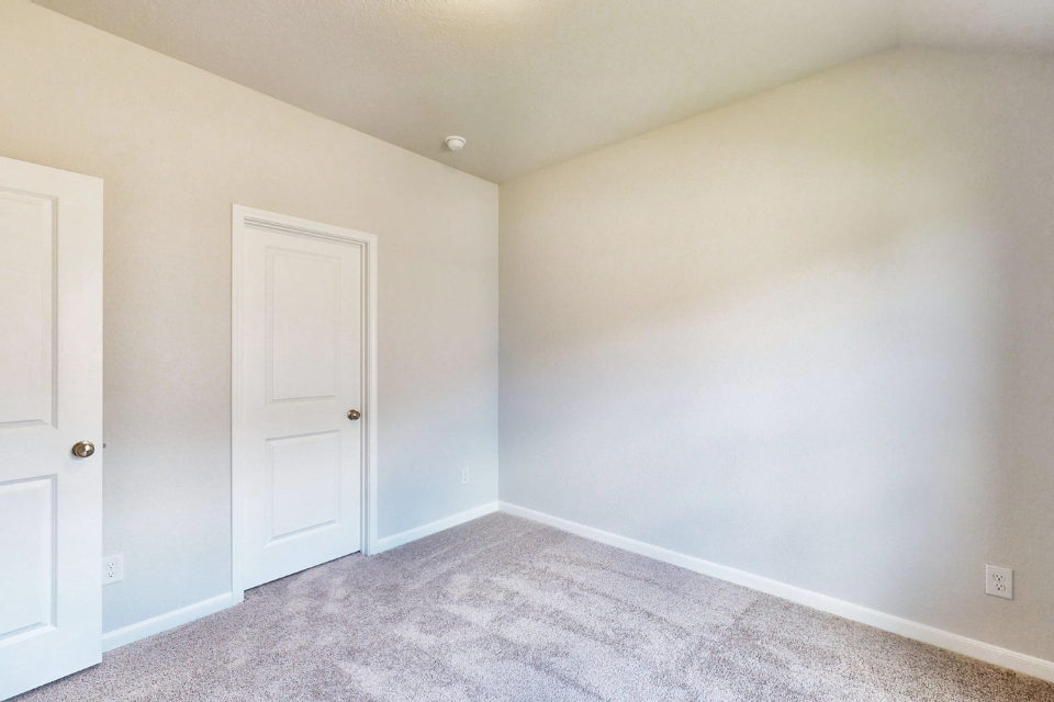A room with white doors.