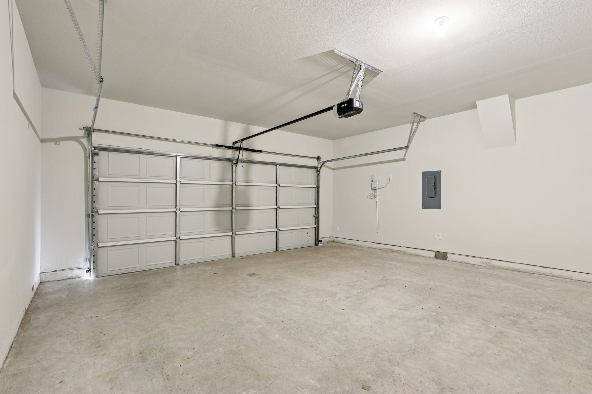 A room with a metal gate.