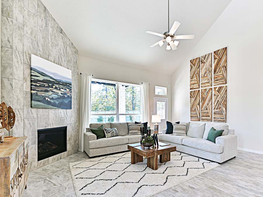 A living room with a fireplace.