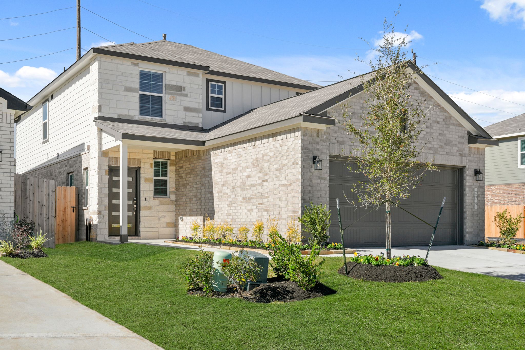 A house with a large front yard.