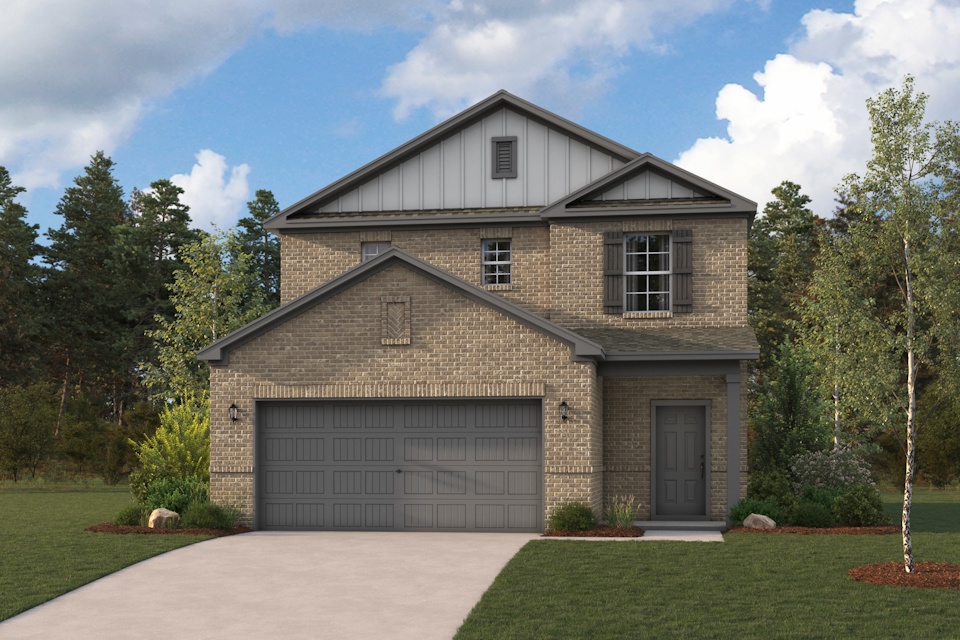 A house with a garage with Orchard House in the background.