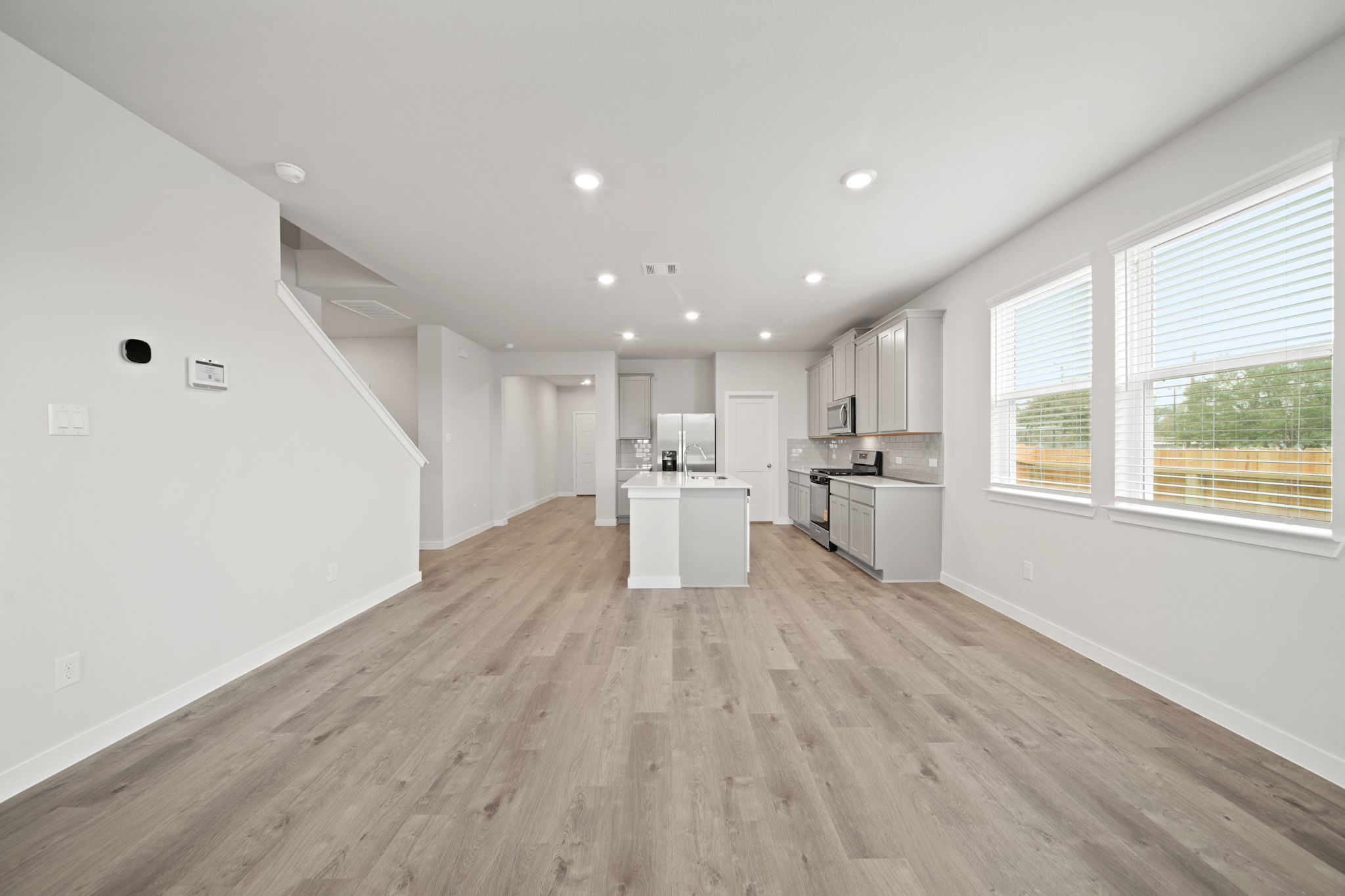 A large empty room with white walls.