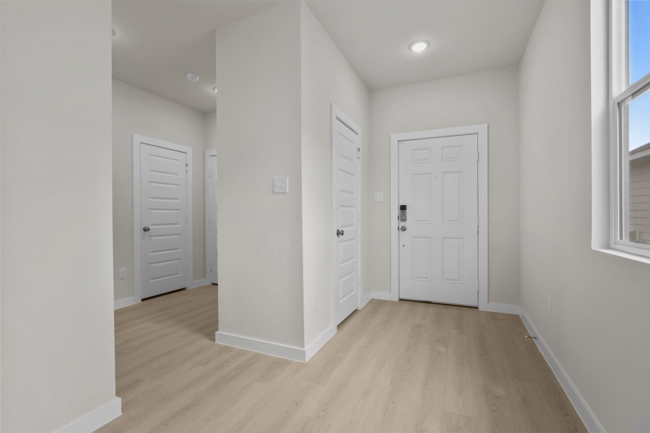 A room with white doors.