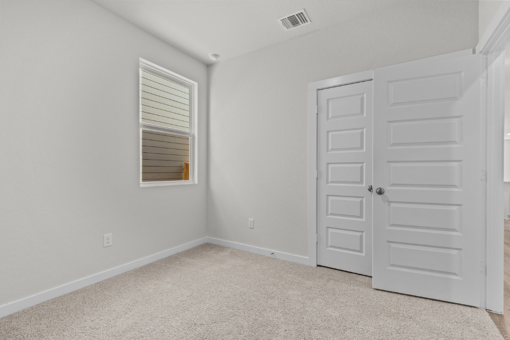 A room with white doors.