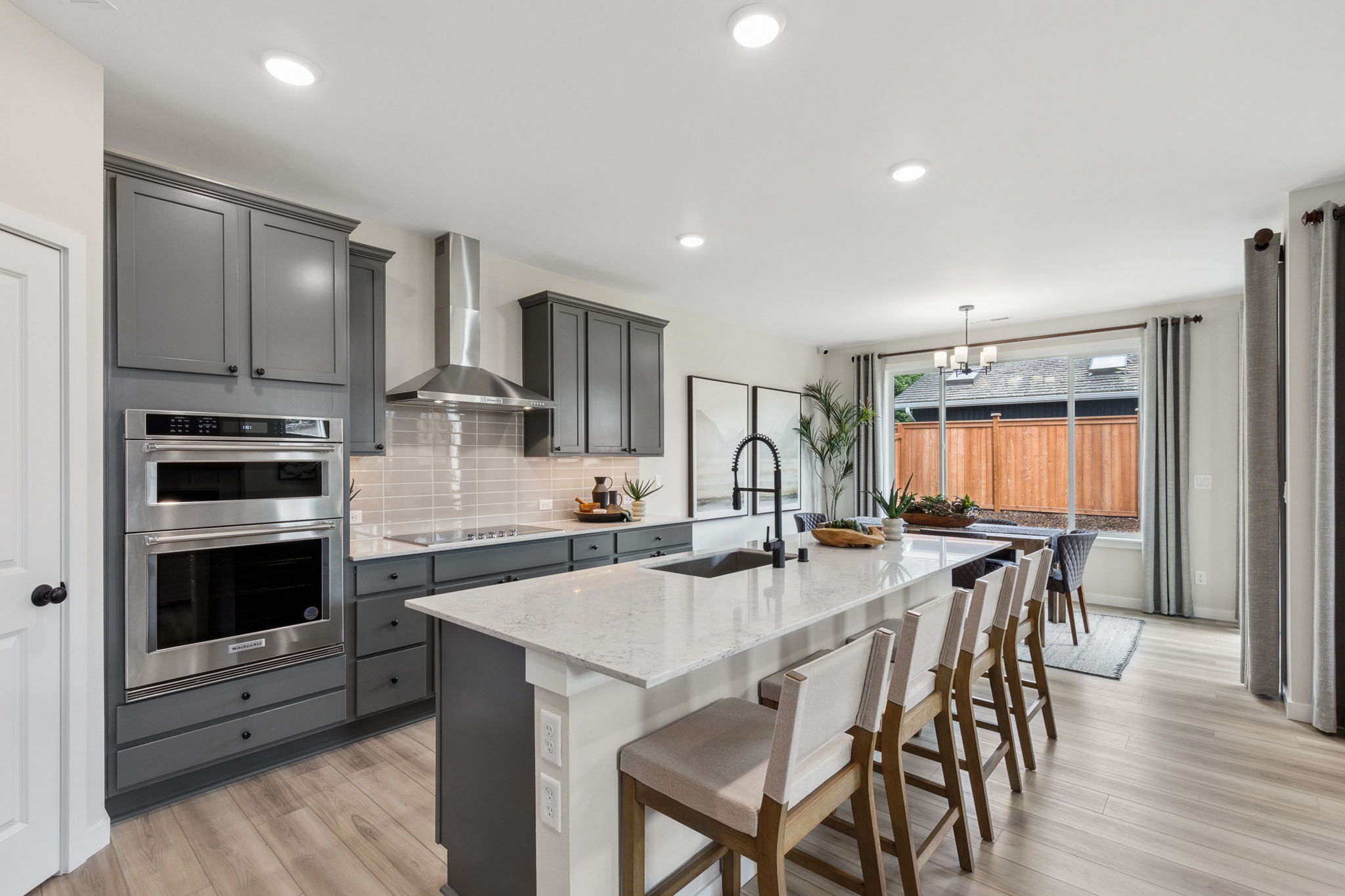 A kitchen with a stove and oven.