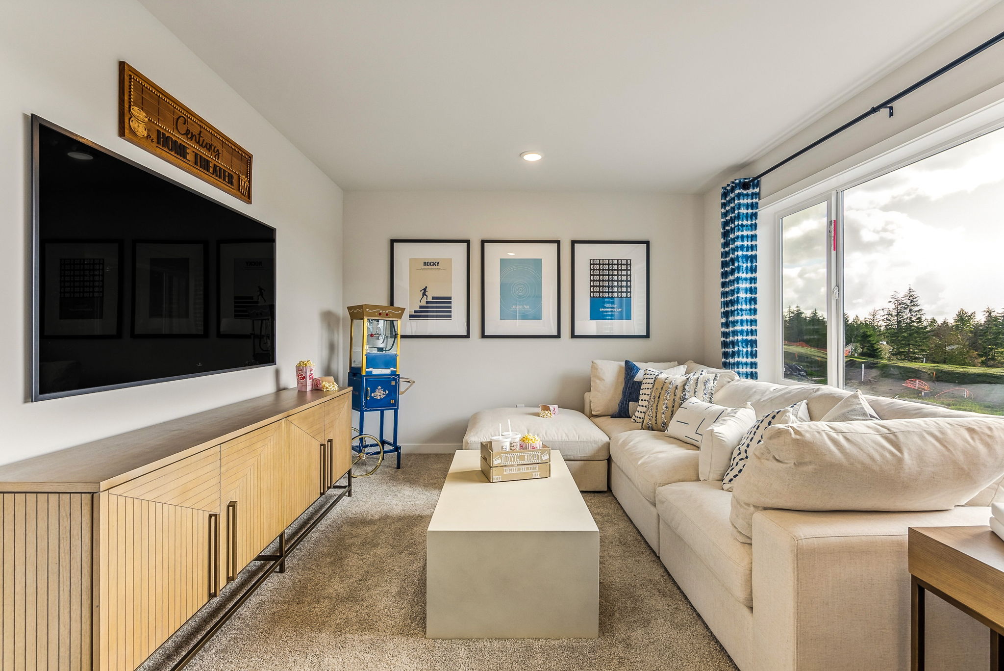 A living room with a tv and couches.