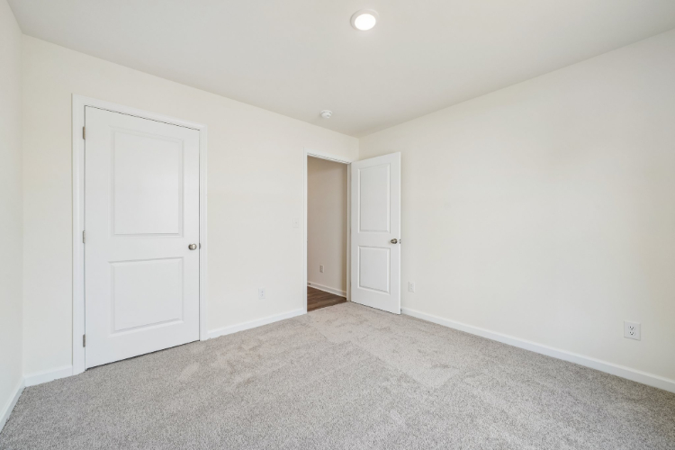 A room with white doors.