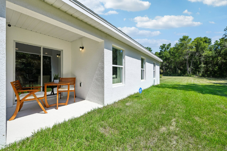 A house with a table and chairs.