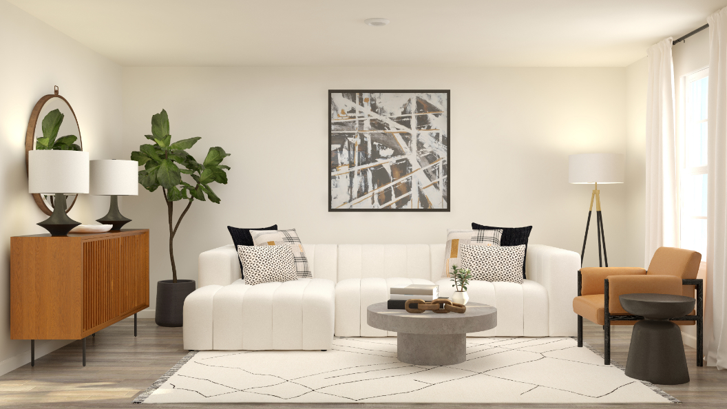 A living room with white couches.