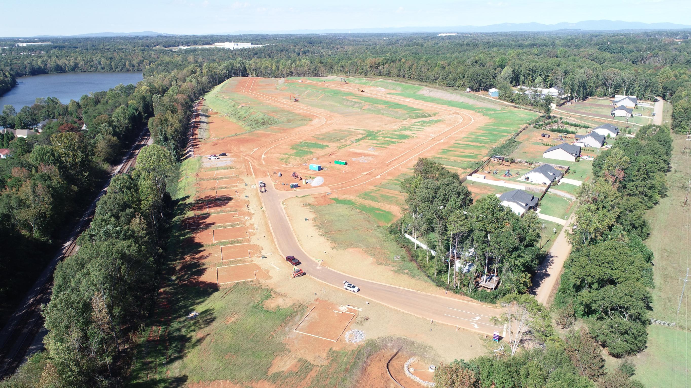 A road with trees and buildings.